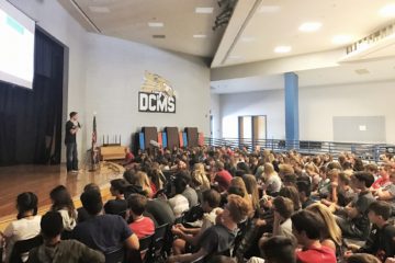 On stage at a local school